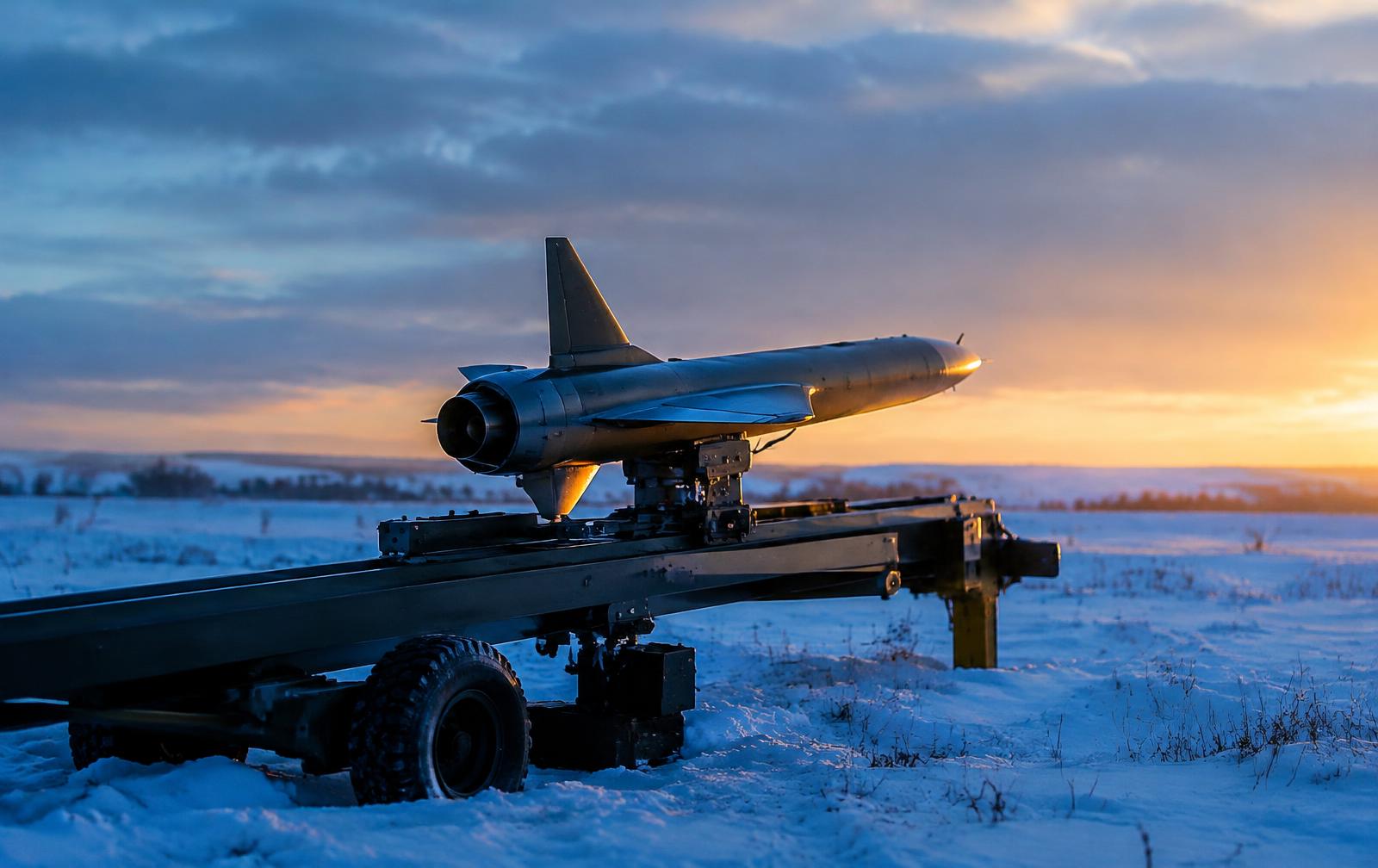 Micro-turbine interceptor drone on a rail launcher in snow